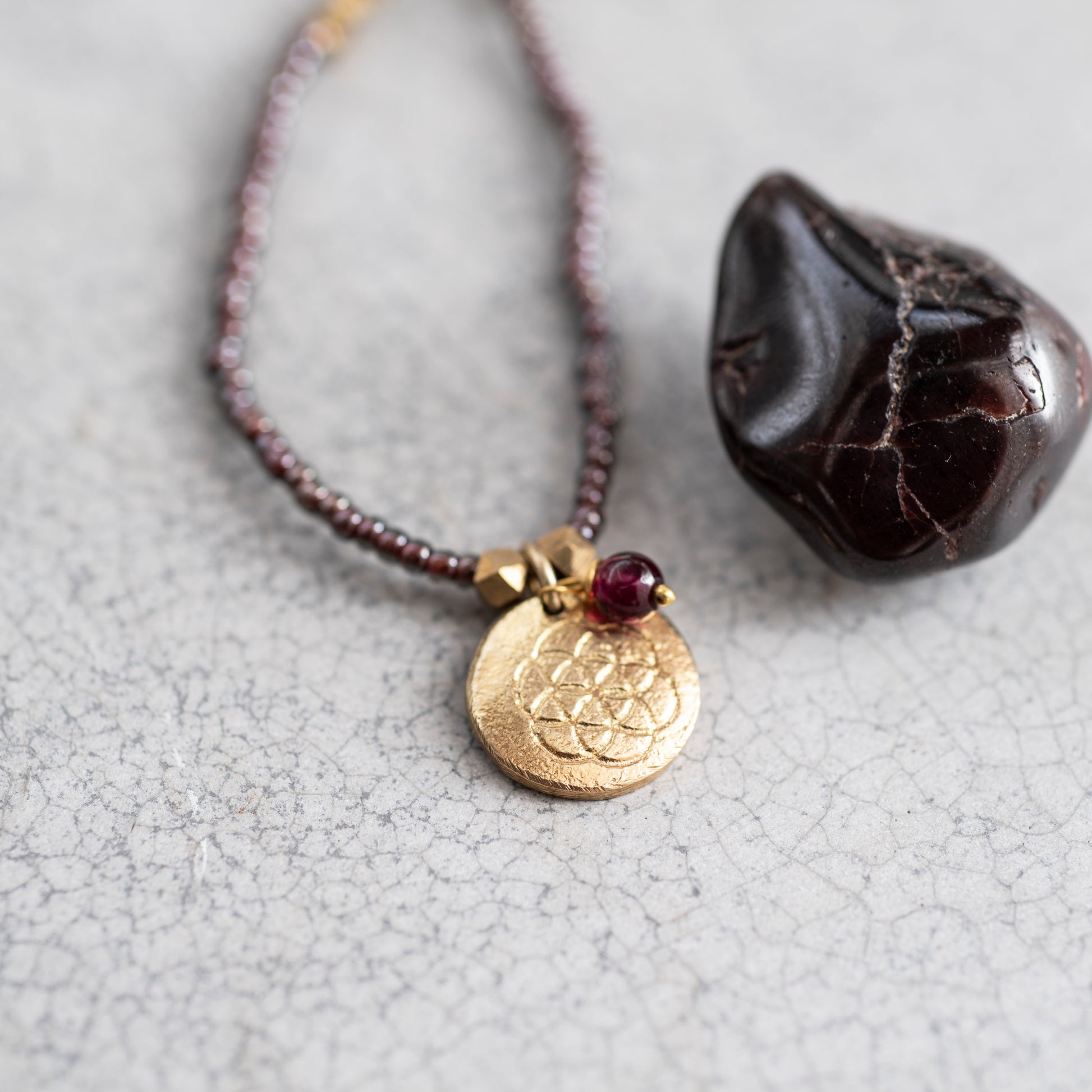 Truly Garnet Flower of Life Gold Colored Necklace