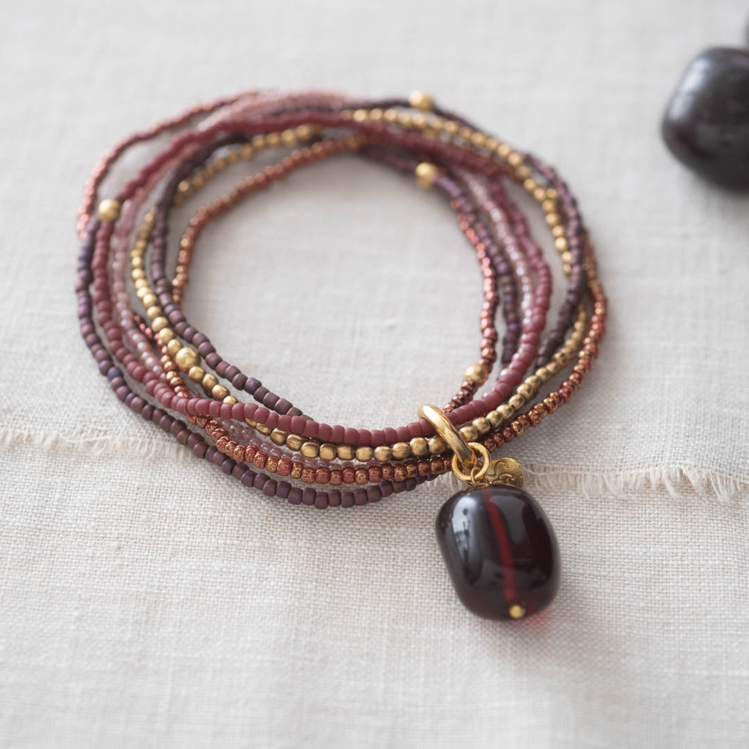 Nirmala Garnet Gold Colored Bracelet