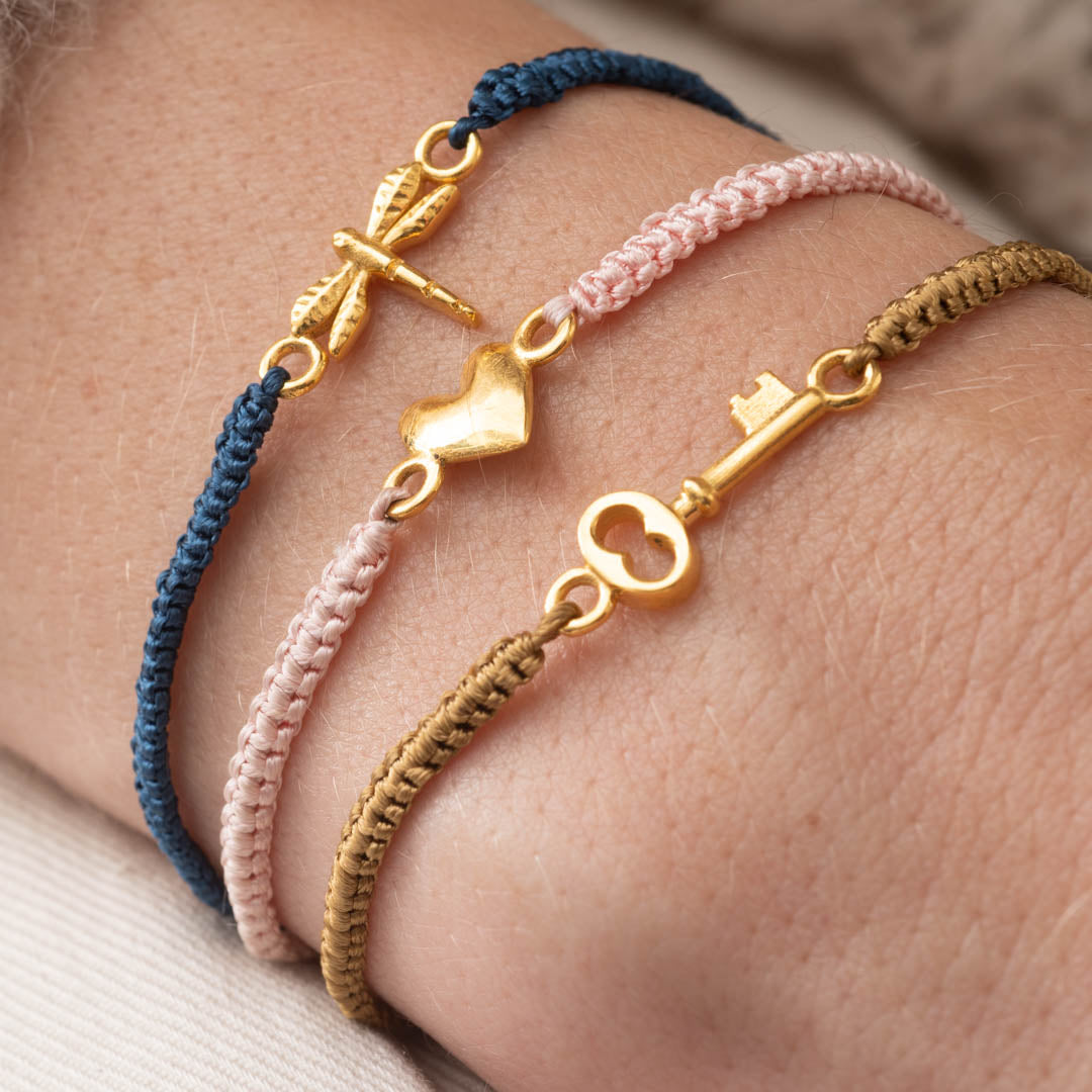 Symbol Key Gold Colored Bracelet